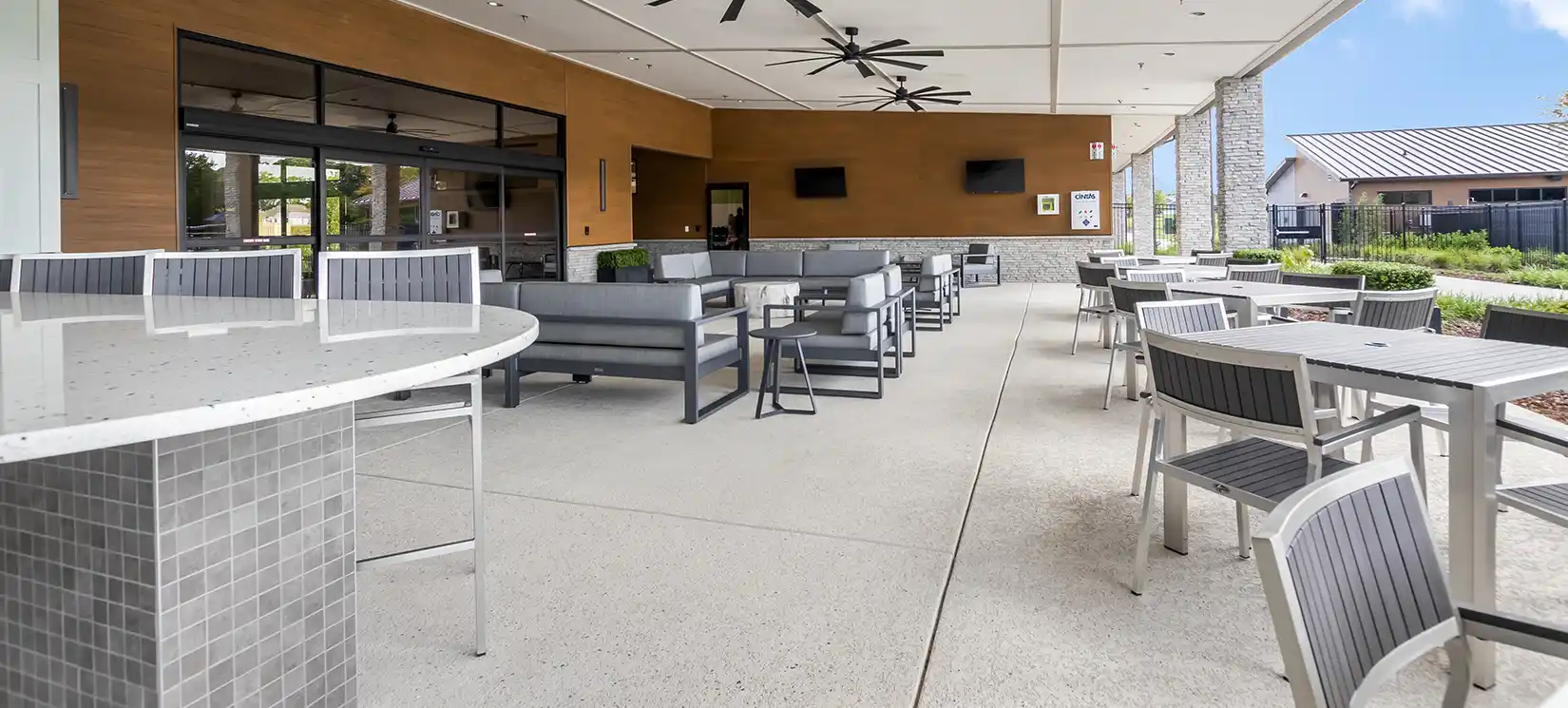 Freedom Amenity South Village Active Adult Amenity Center Clubhouse Poolside Patio Bar in at Nexus in Gallatin Tennessee